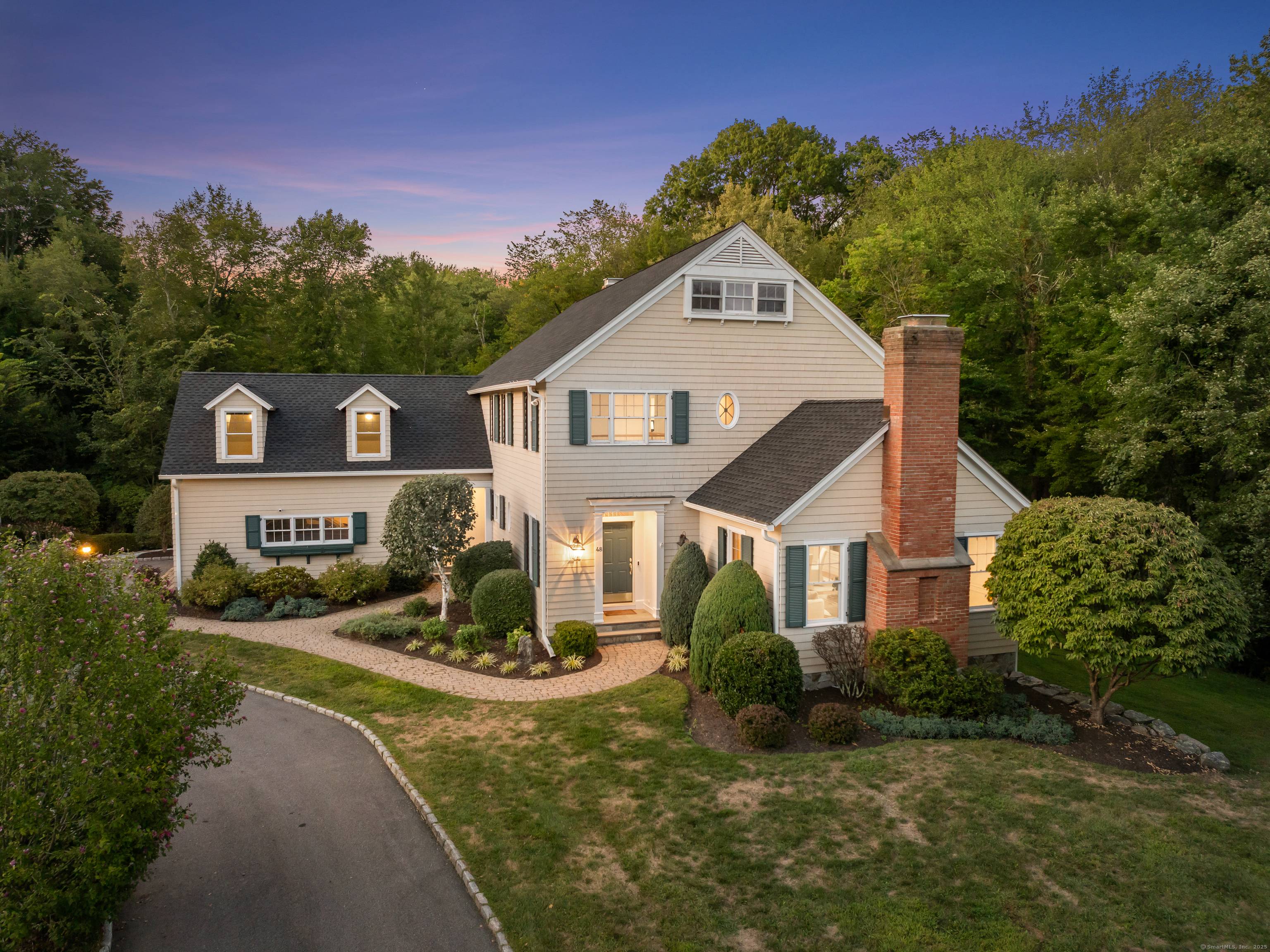 Discover this beautiful 1996 Colonial, located in a quiet South Wilton cul de sac on over 2 private acres.