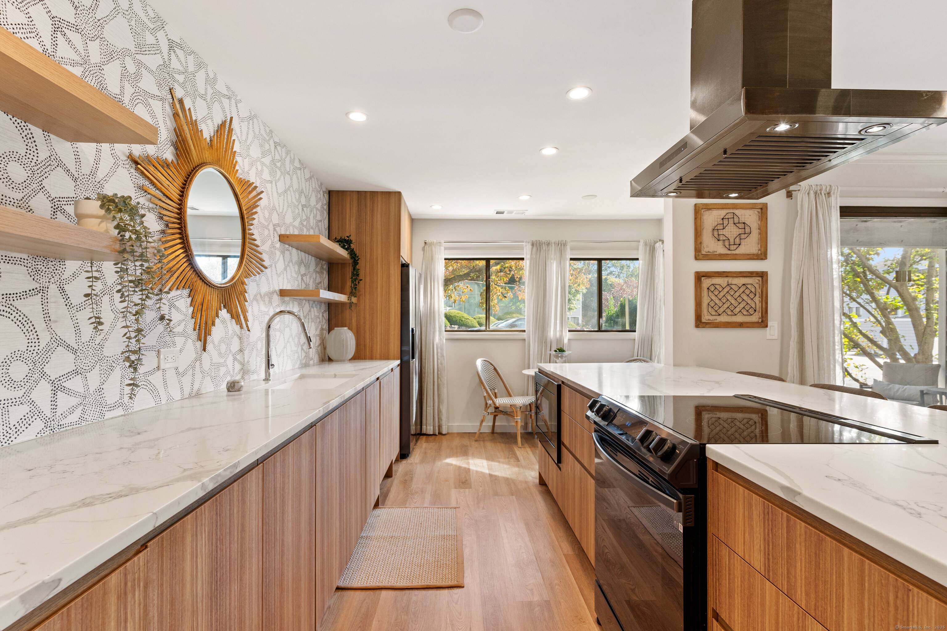 This fully renovated 3 bedroom, 2 bath ground floor condo offers the perfect blend of modern style, comfort, and convenience.