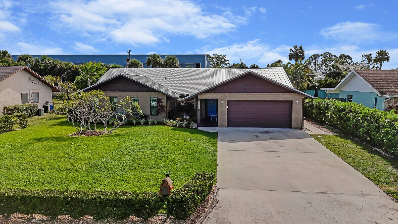 New metal roof, whole house generator, impact windows, pool, 400 SF screened lanai, new A C, 3 bed 2 full bath, no maintenance, solid brick construction with 2 car attached ...