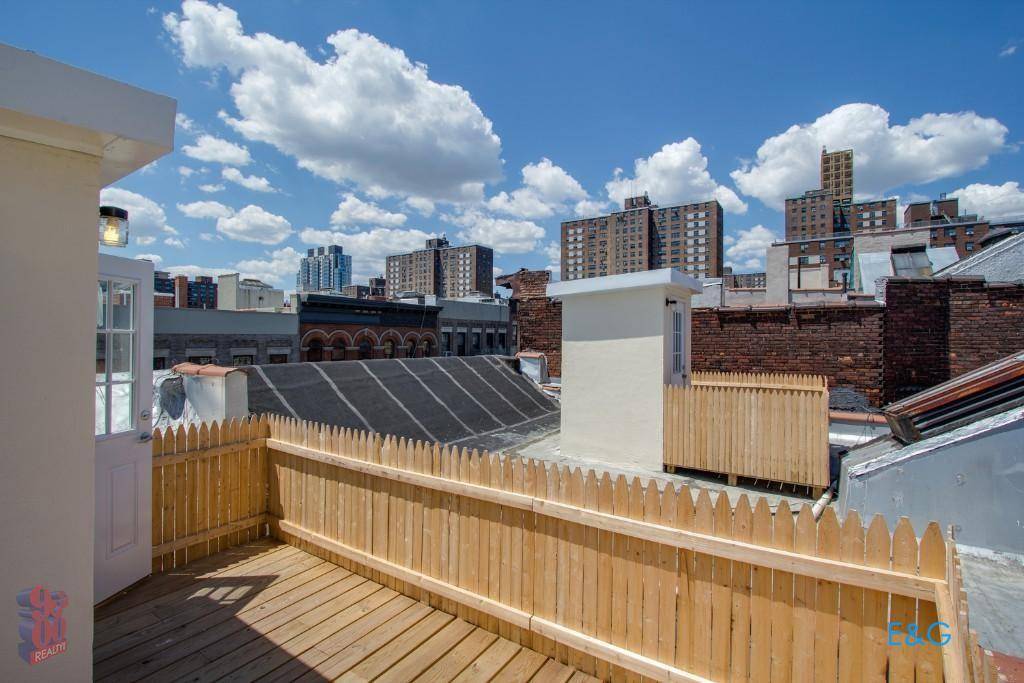 Available for February 1 occupancy, this beautifully renovated 2 bedroom 1 bathroom apartment with modern updates features a private roof deck, an updated kitchen with dishwasher, beautiful hardwood floors and ...