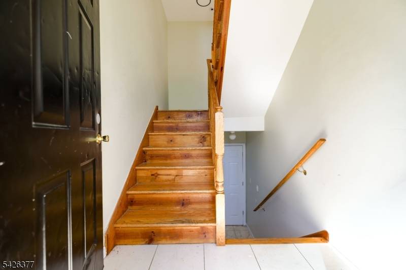 Newer construction two family home built in 2005, offering generous living space and flexible layout options.