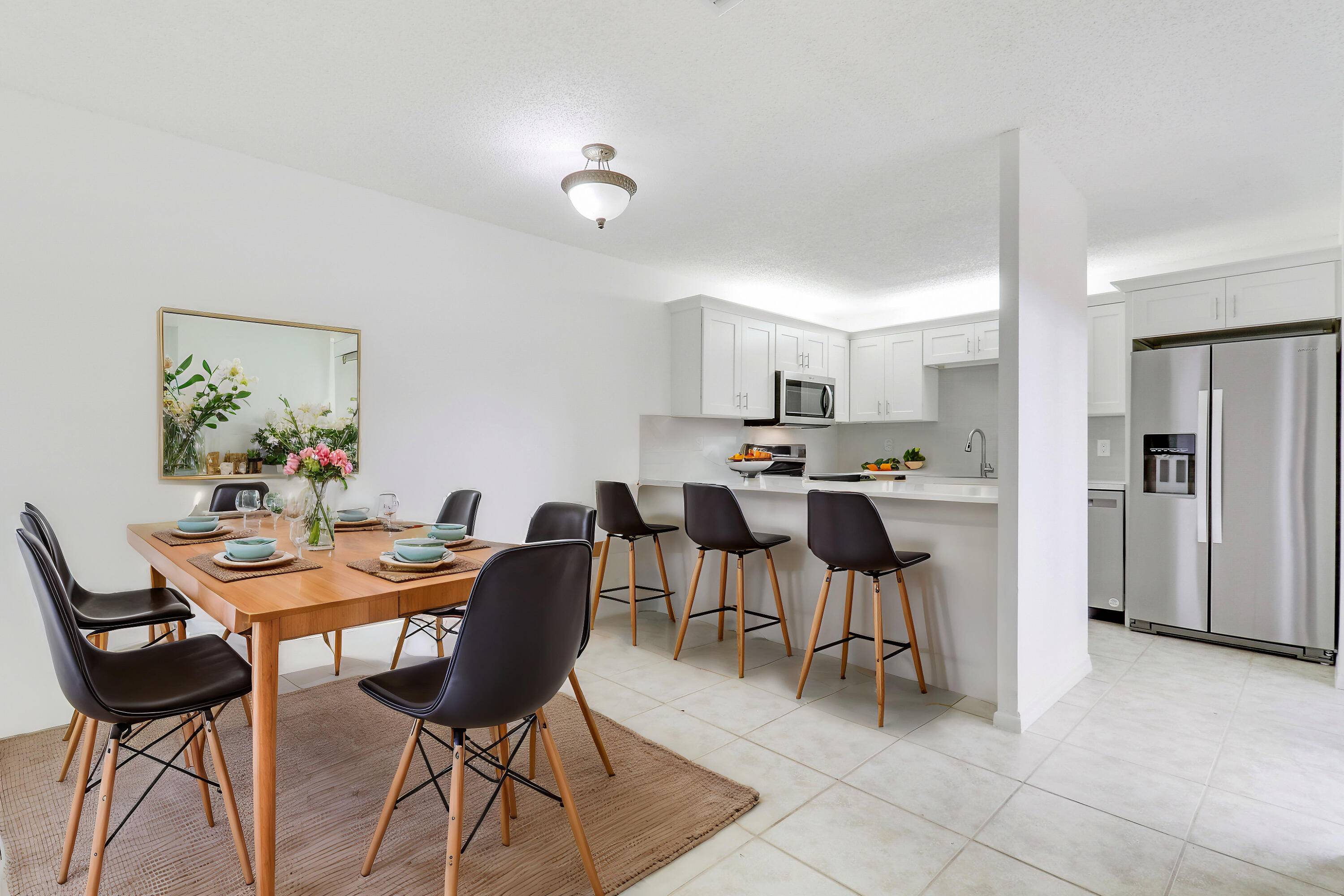 Beautifully updated with a brand new roof, this 2BR 2BA condo in a prime location across from the pool, clubhouse, gym, tennis, and pickleball.