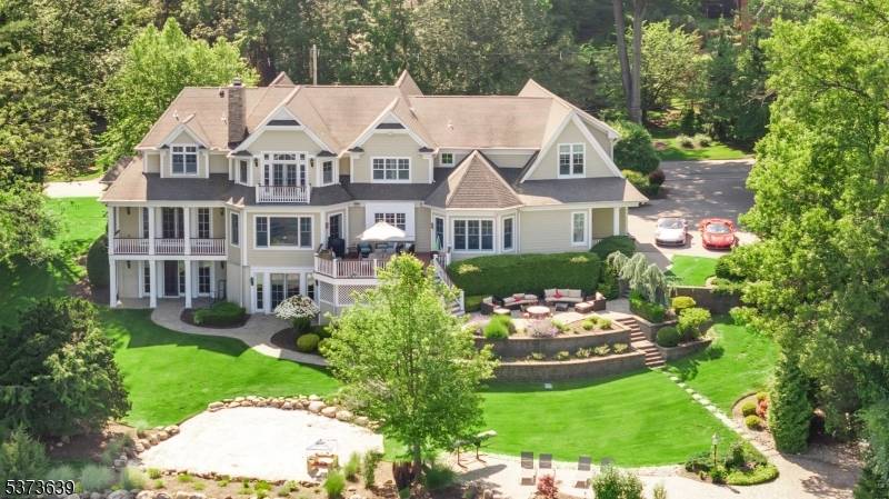 Welcome to this exceptional lakefront home in the highly desirable Pines Lake community.