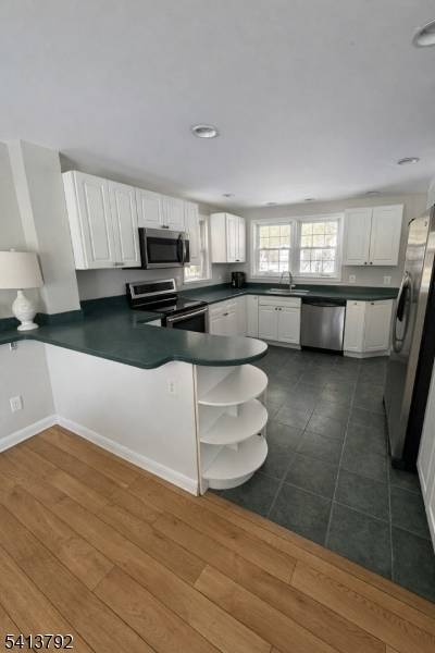 Charing super clean Colonial style home with two can garage with mudroom which includes washer and dryer.