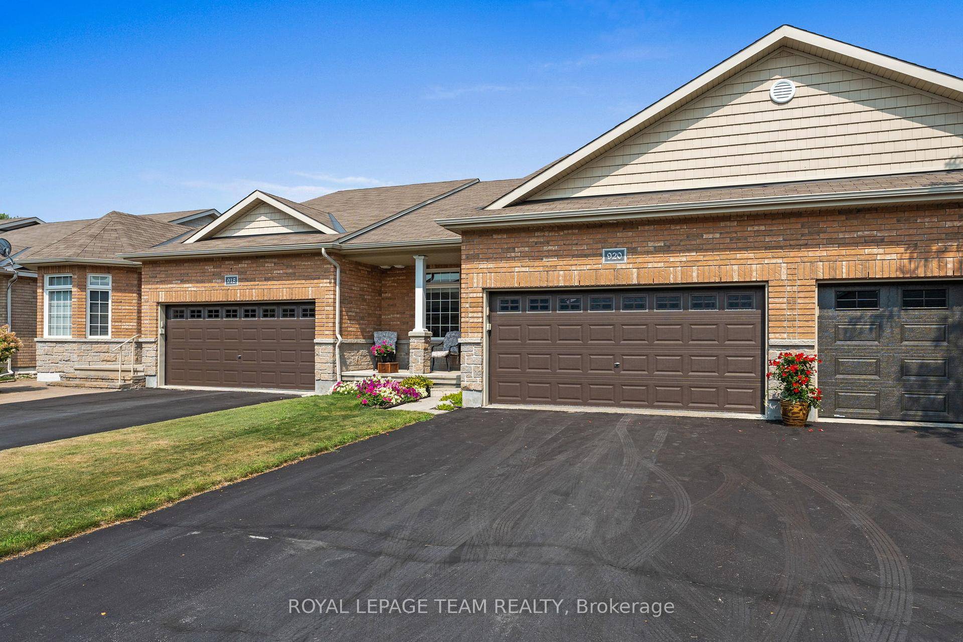 Welcome to this inviting Longwood built Brooklea model bungalow, offering 2 bedrooms and 2 baths, perfectly situated on a premium lot backing onto a walking path with direct gate access.
