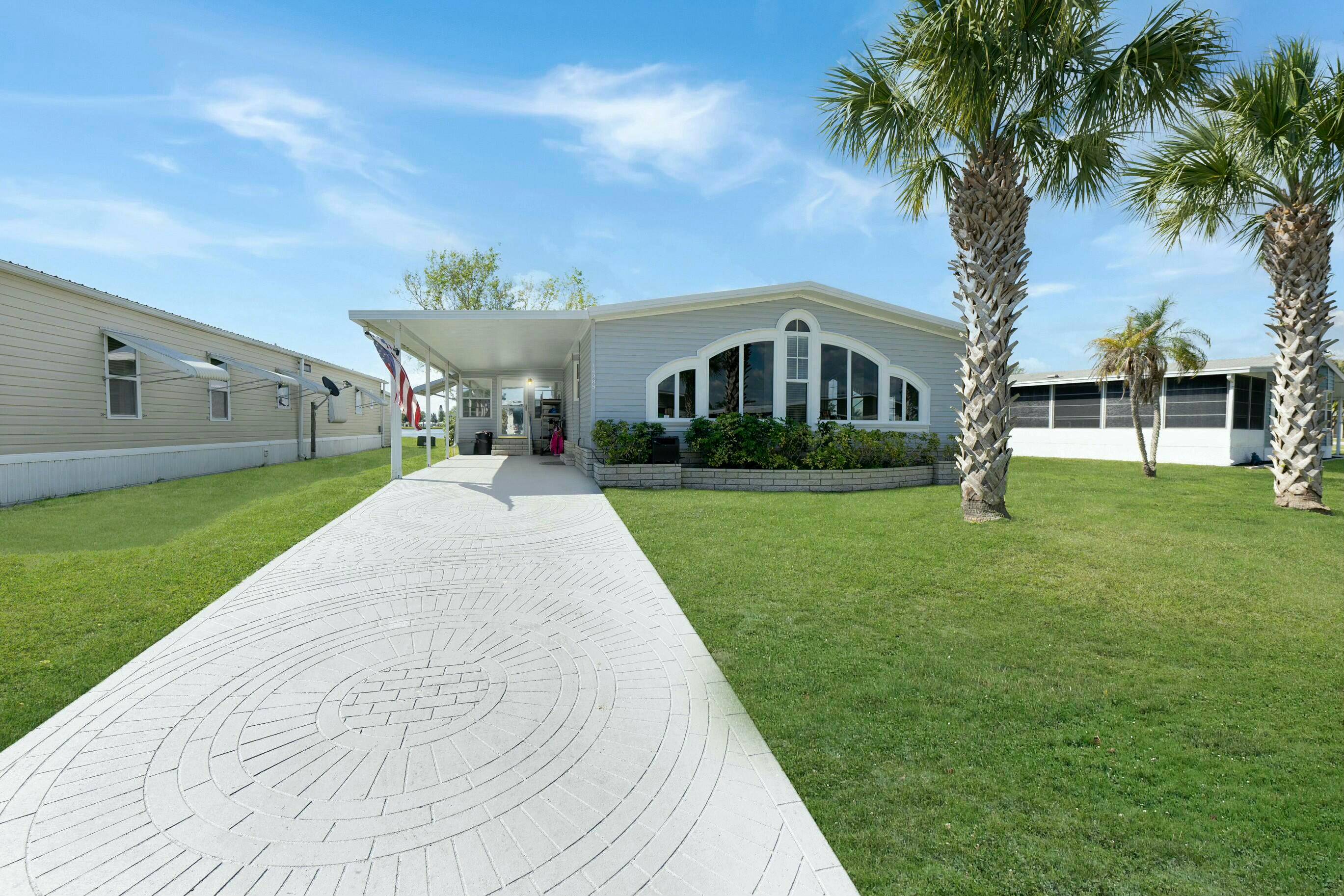 Charming 2 Bedroom, 2 Bath in Spanish Lakes Fairways with beautiful lake view.