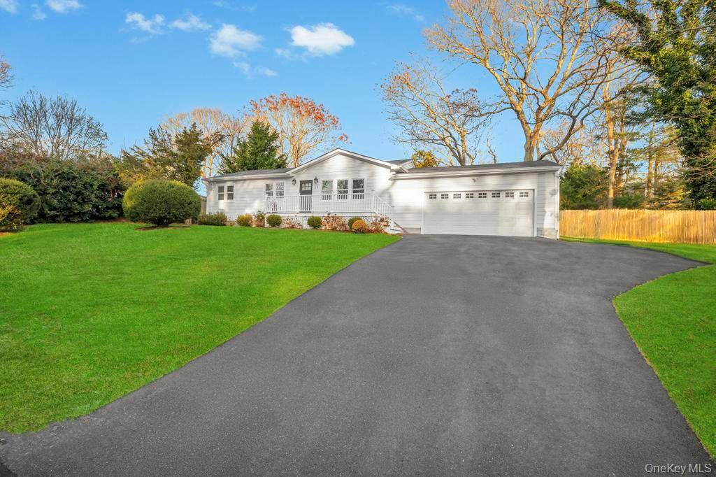 Welcome to 12 George Street, Hampton Bays a fully renovated ranch style home offering modern comfort in a prime location.