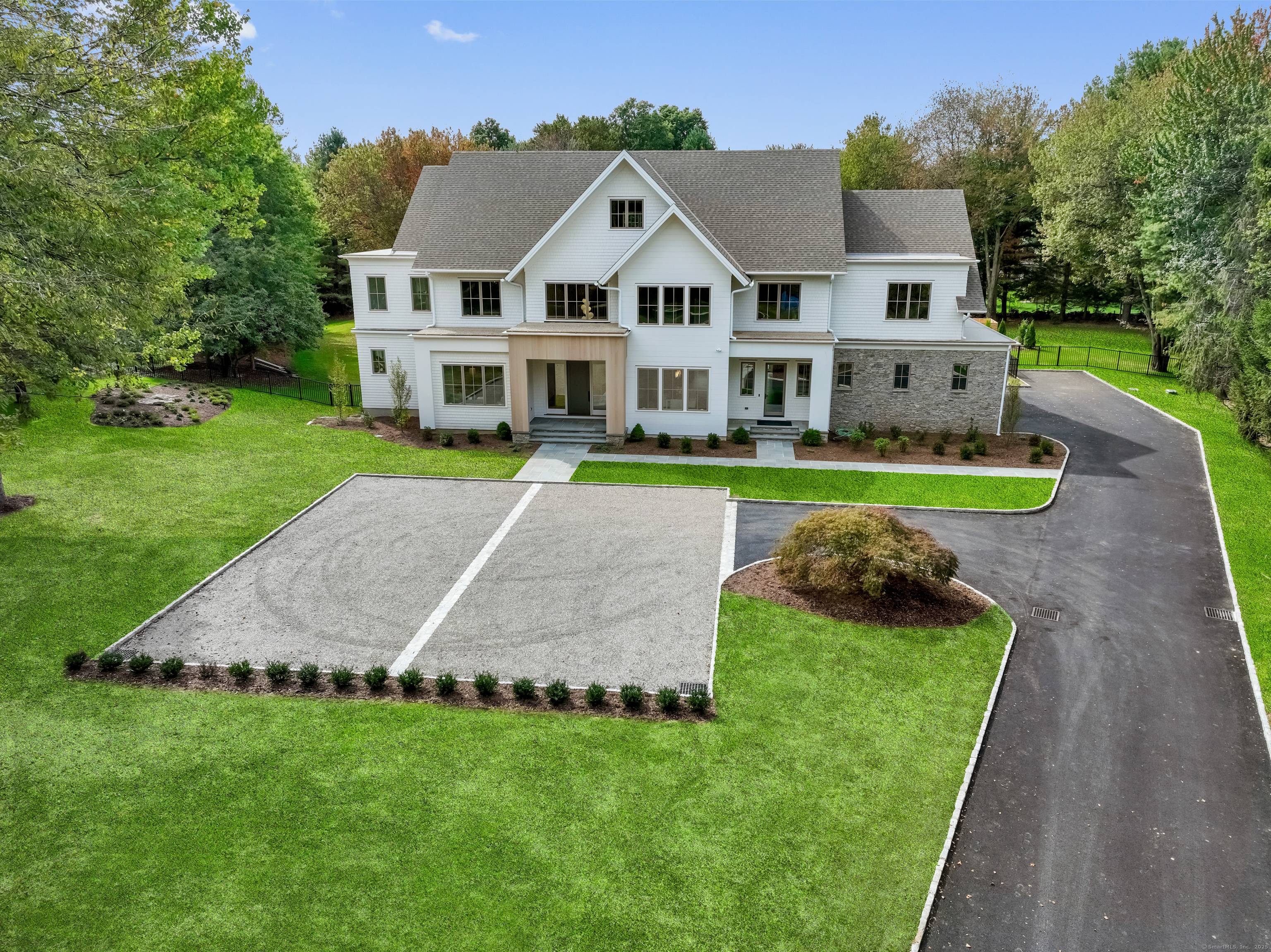 Now complete ! Set on over 2 acres in one of Westports's most desired neighborhoods, this stunning new construction by HOBI award winner, Rick Benson, blends modern luxury with timeless ...