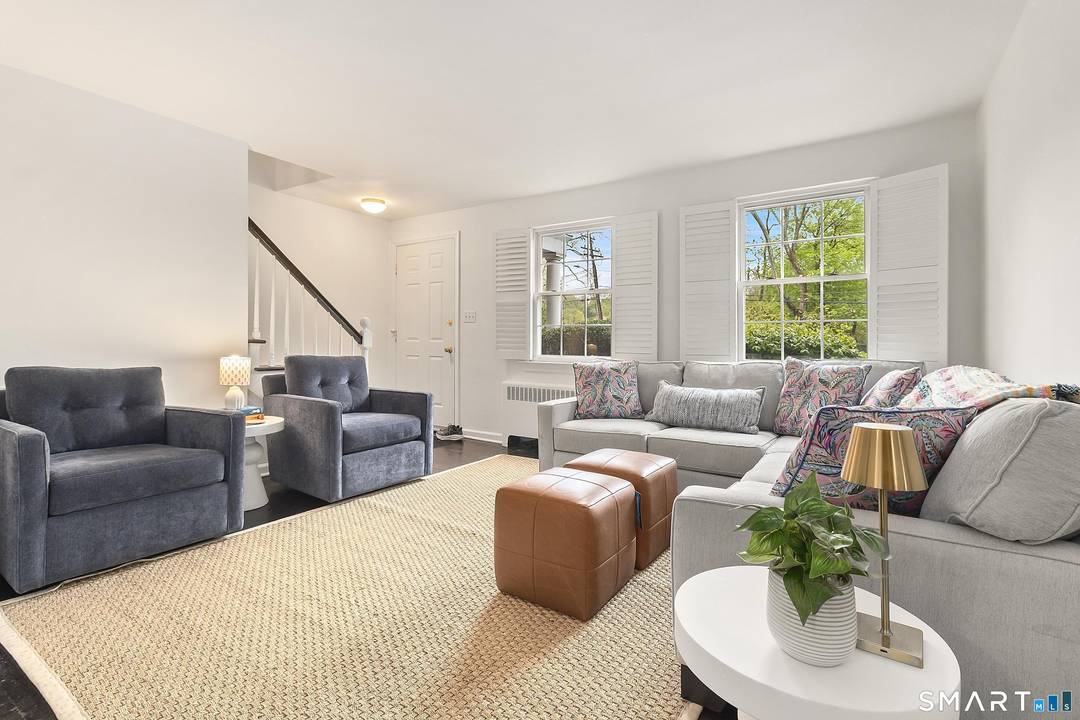 Overlooking a picturesque golf course, this beautifully updated 3 level townhouse offers a rare blend of space, light, privacy in a prime Stamford location.