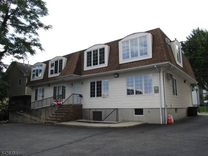 This attractive multi family building offers four spacious two bedroom apartments, each featuring a large living room, dining area, kitchen, and full bath layouts tenants love and demand.
