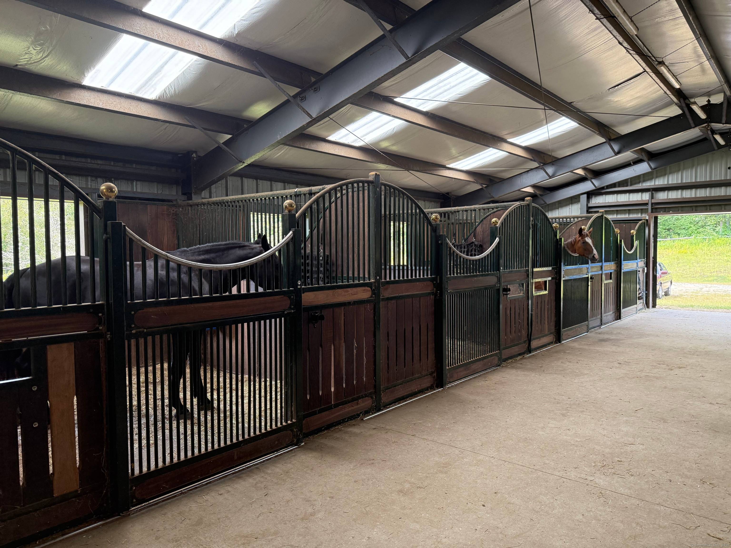 Wind Dance. The 61 acre parcel at 45 Hoadly Road, Hebron is a remarkable property offering exceptional equestrian facilities and ample space for future development.