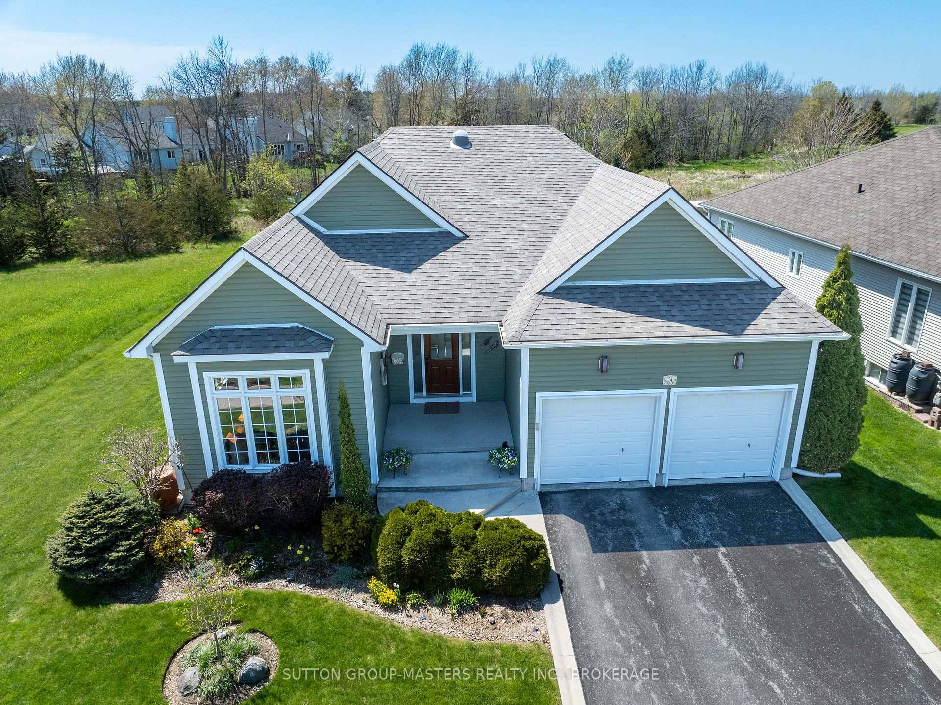 Meticulously maintained and thoughtfully updated, this spacious bungalow sits on a large, private lot backing onto green space, with golf course views and stunning northwest sunsets.
