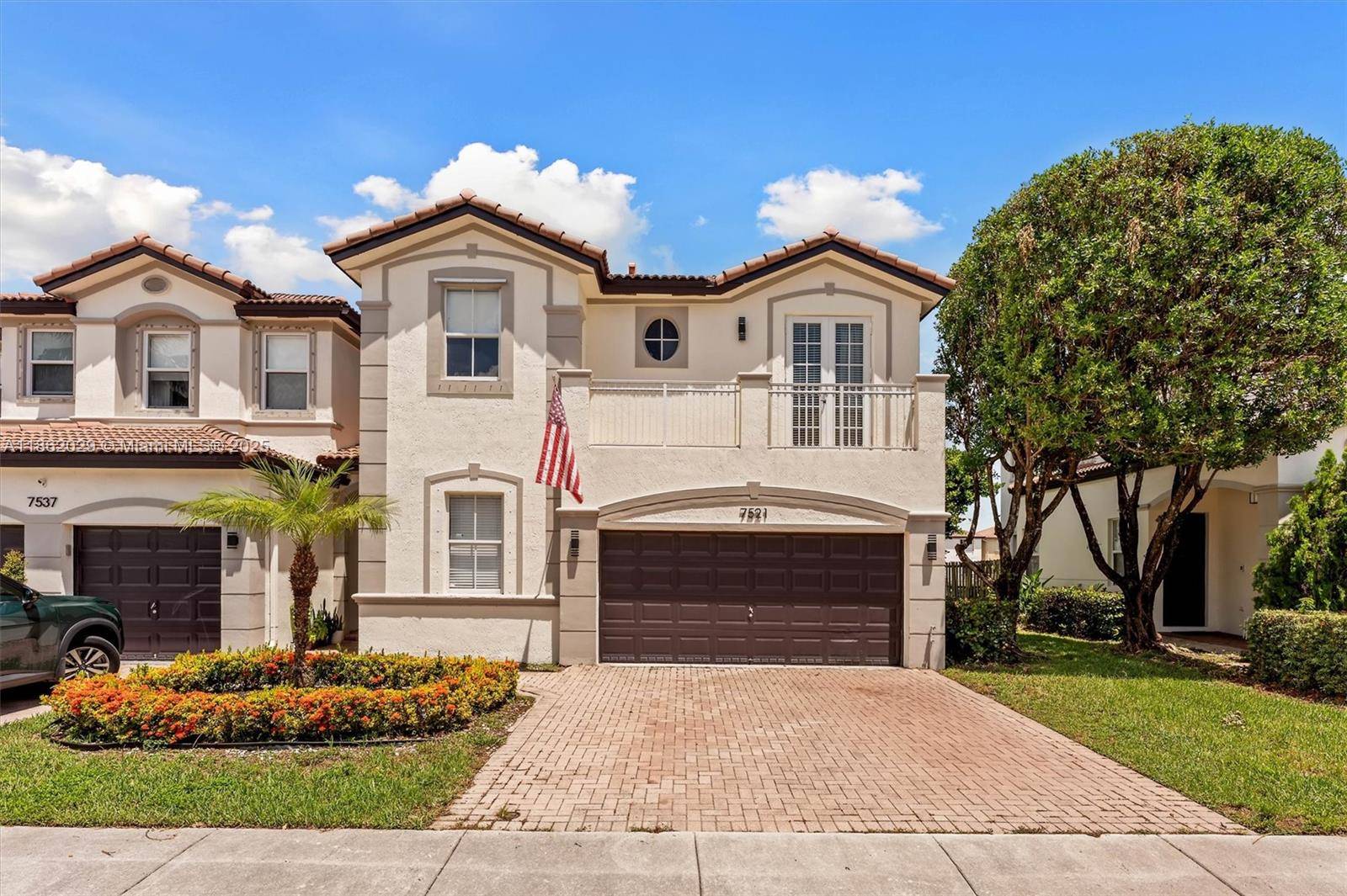 Stunning corner townhouse in the sought after Polynesian at Islands at Doral.