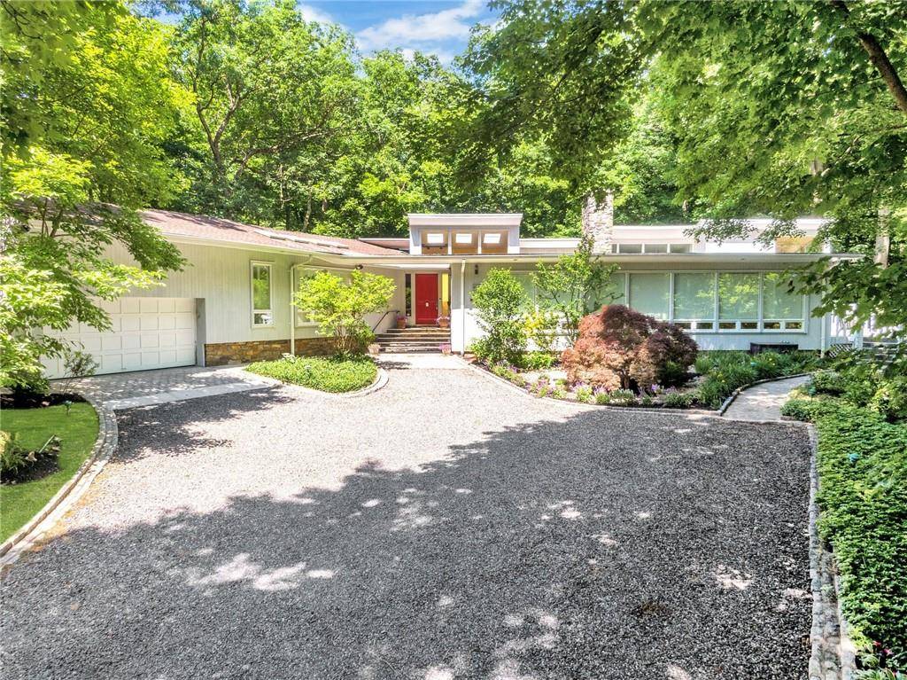 Discover the perfect blend of modern elegance and serene seclusion in this stunning contemporary ranch style home.