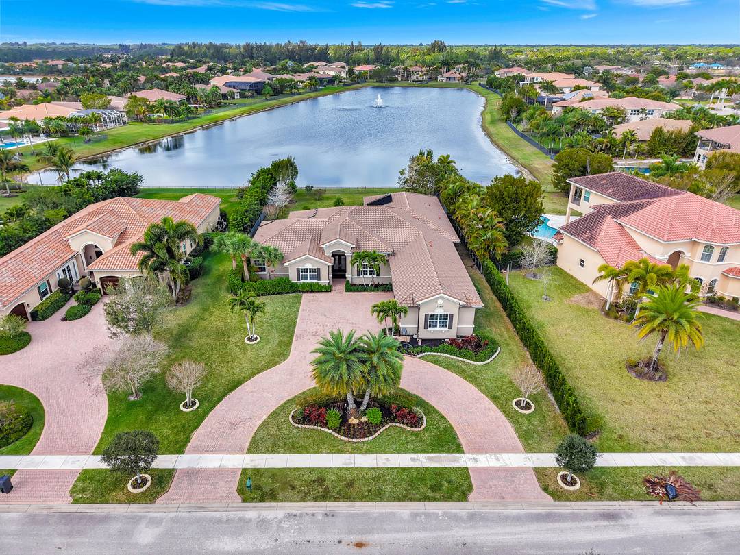 Enjoy breathtaking, expansive lake views from nearly every room in this exceptional luxury residence located in the gated community of The Preserve at Bay Hill Estates.
