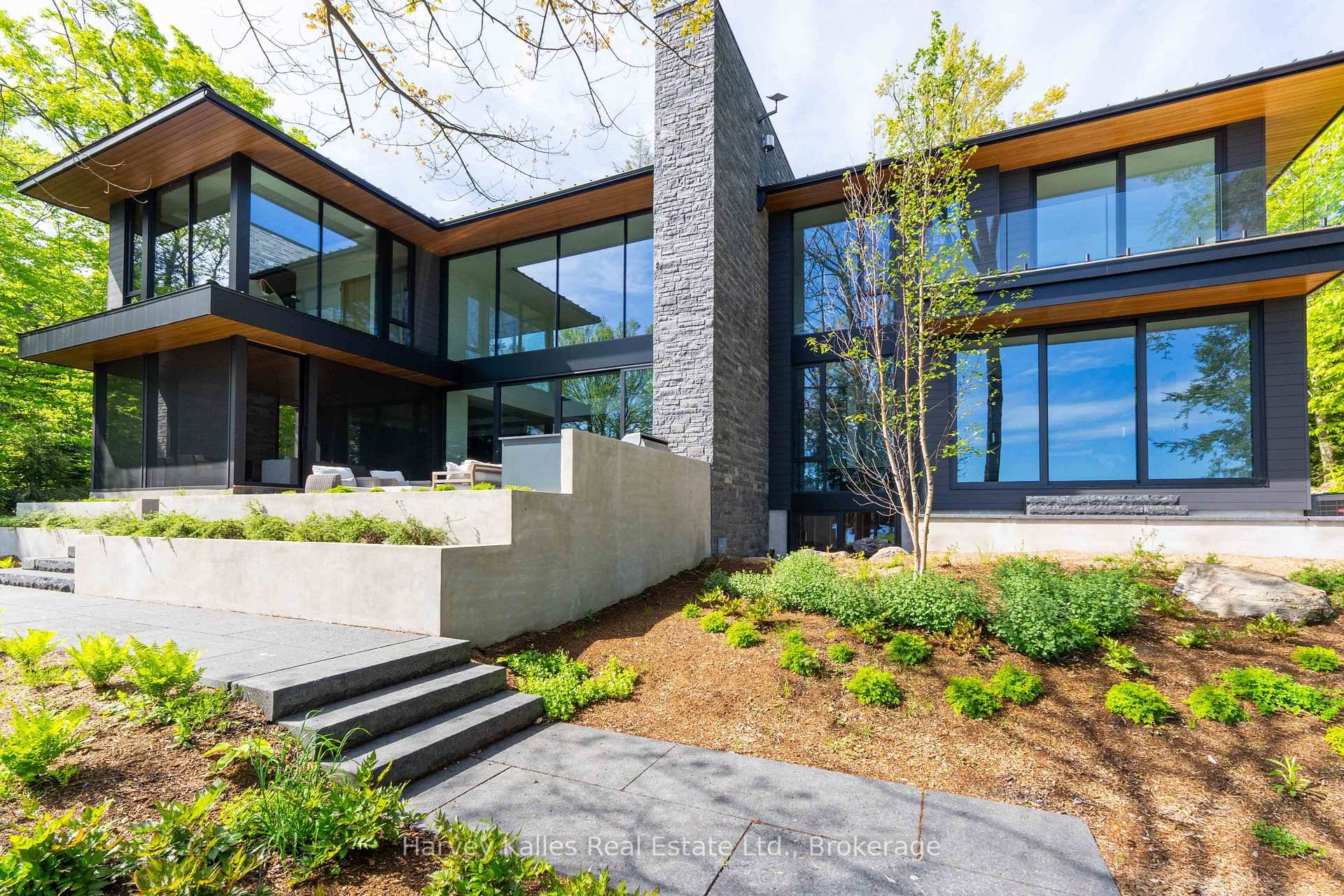 A stunning union of natural beauty and architectural excellence on the prestigious and coveted Innisfree shores of Acton Island.