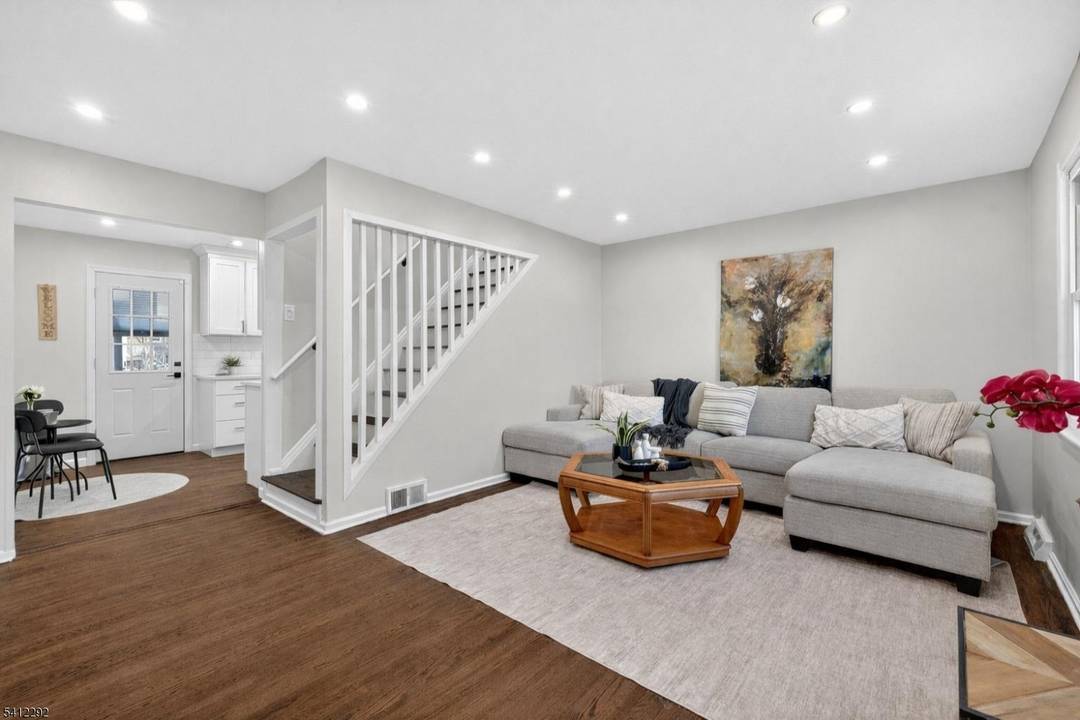 Welcome to 5 Lois Avenue in East Brunswick, a fully remodeled Cape Cod that delivers far more space and impact than you would expect at first glance.