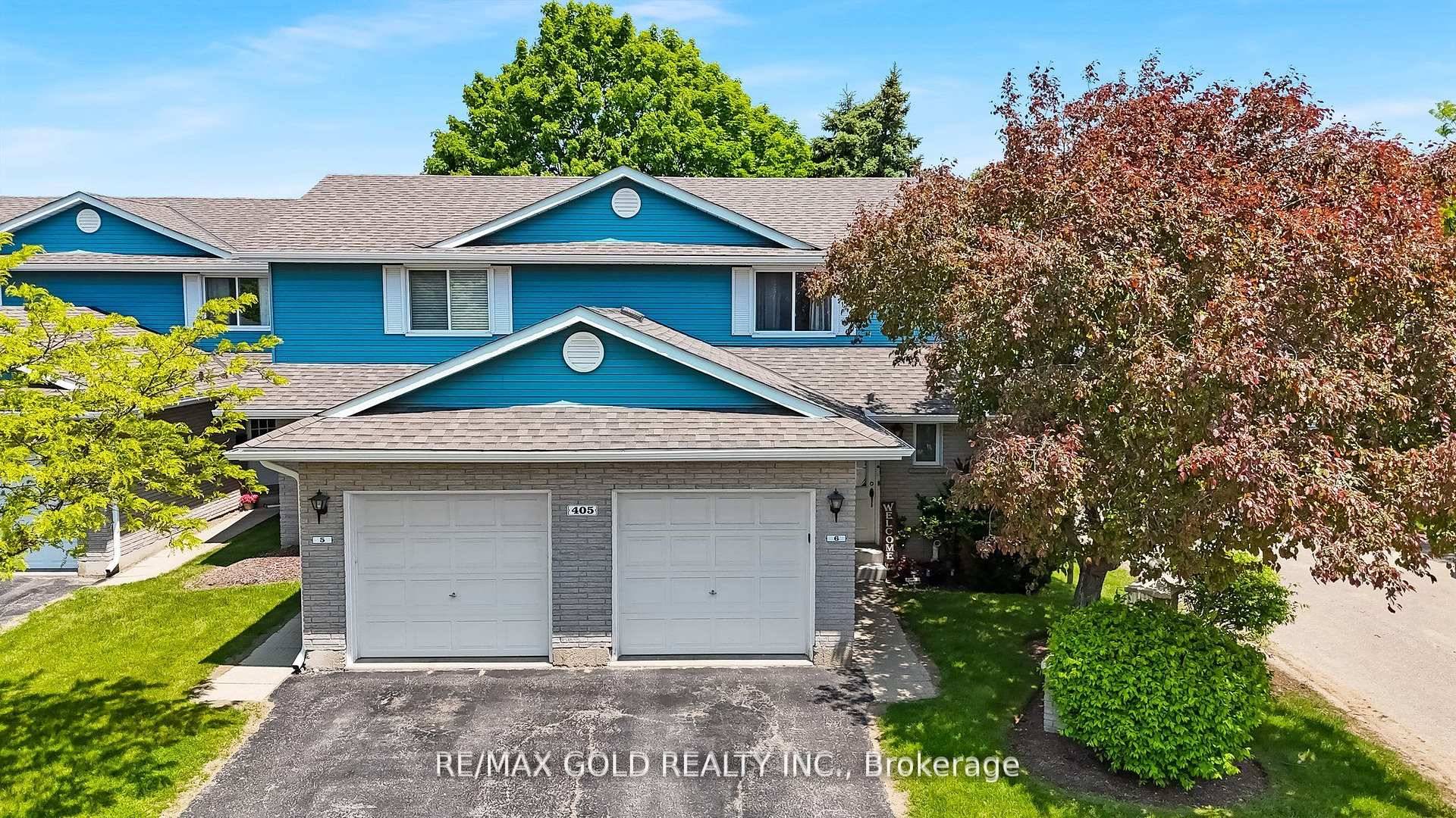 Welcome to Unit 6 Kingscourt Drive, a move in ready corner townhouse nestled in the prestigious Colonial Acres neighborhood of Waterloo.