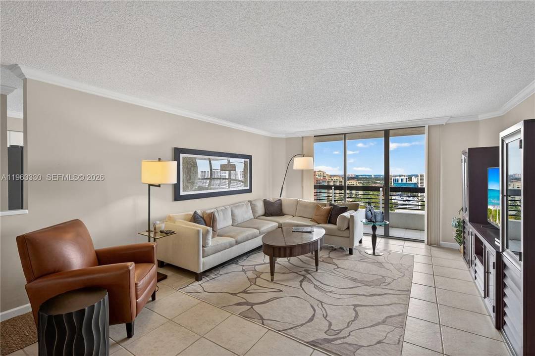 Experience luxury living in this exceptional Mystic Pointe condo, featuring one of the community s best floorplans.