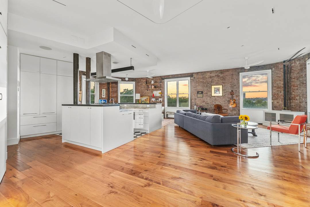 Welcome to 214 Riverside Drive a rare, light filled loft style home offering breathtaking, unobstructed views of the Hudson River and Riverside Park.