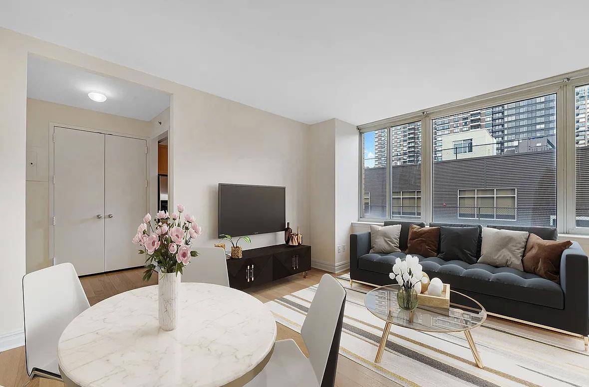 Bright Alcove studio apartment with Southern open views to the bridge in a full service luxury condominium.