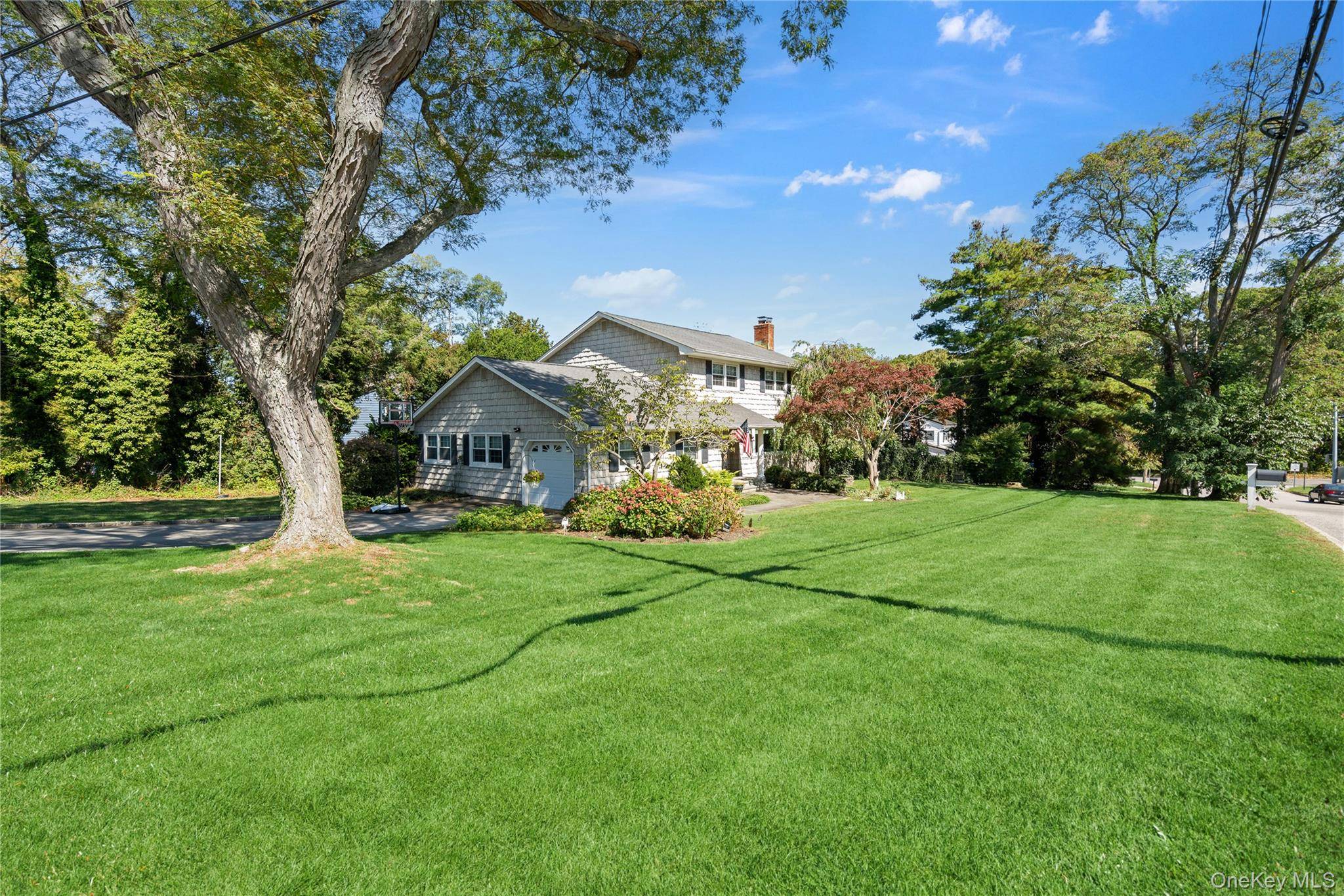 This Lovely Colonial is waiting for you in Highly sought after Rustic Acres on a Beautiful Corner Lot.