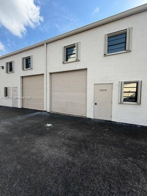 MOTIVATED SELLER ! ! ! Prime opportunity to acquire two adjacent commercial condo units in a highly sought after industrial corridor near Tamiami Airport.