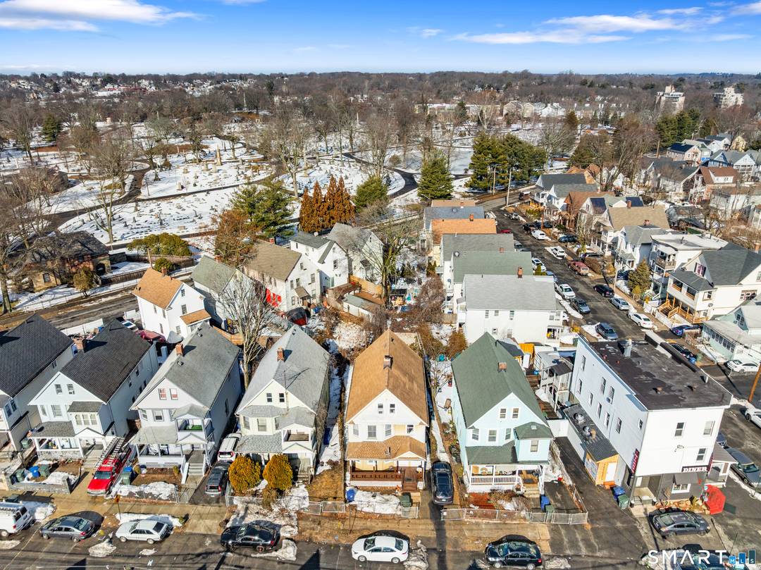 Renovated in 2025 this 2 family home features 11 Rooms, 5 Bedrooms, 2 Full 1 Half Bathrooms.