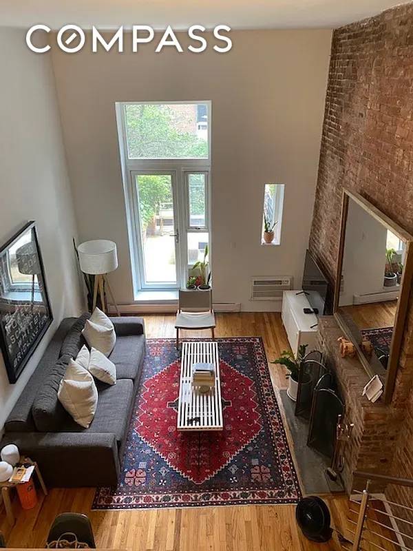 Welcome to your perfect loft just one flight up with a 155 SF private terrace with garden views !