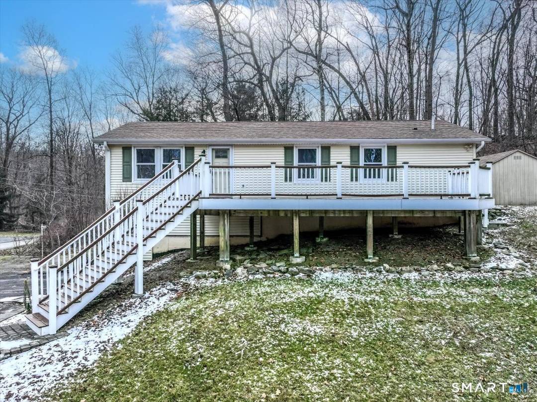 27 Long Meadow Lane offers 3 bedrooms and 2 full and 1 half baths.