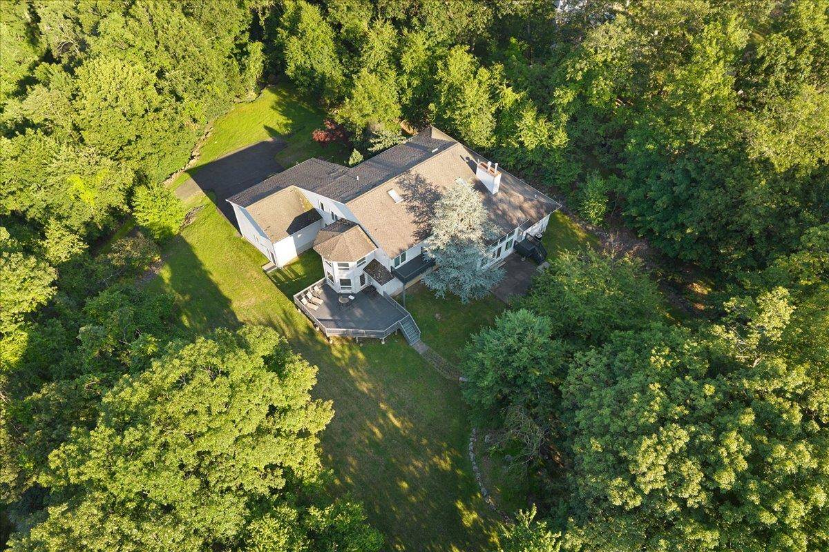 Welcome to this beautifully designed 4 bedroom, 4 bathroom estate set on a meticulously landscaped 1.