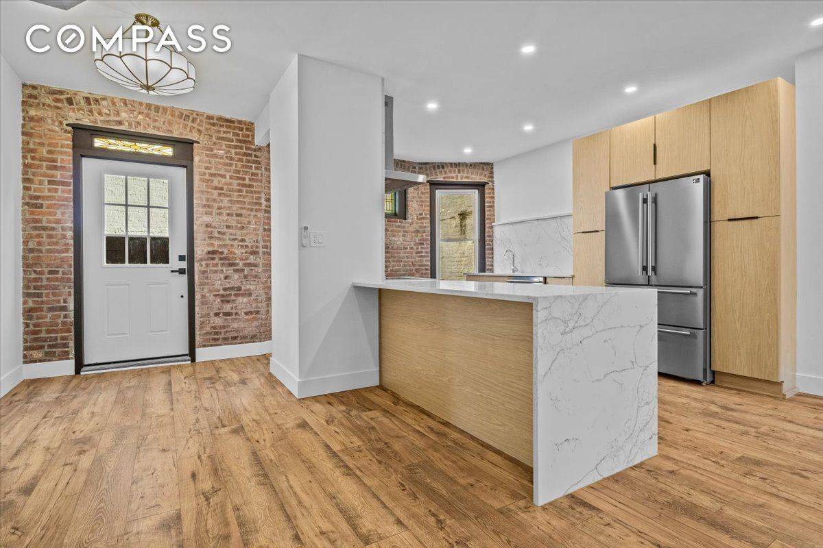 Be the first to live in this turn key three bedroom, two and a half bathroom 20 foot wide brick townhouse featuring timeless designer style, private outdoor space, brand new ...