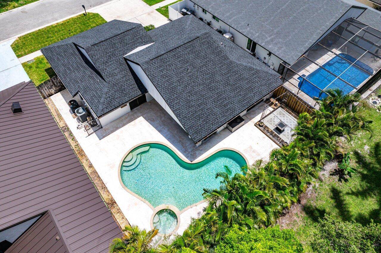 Welcome to this single story pool home located in Country Landing I of Loggers' Run !