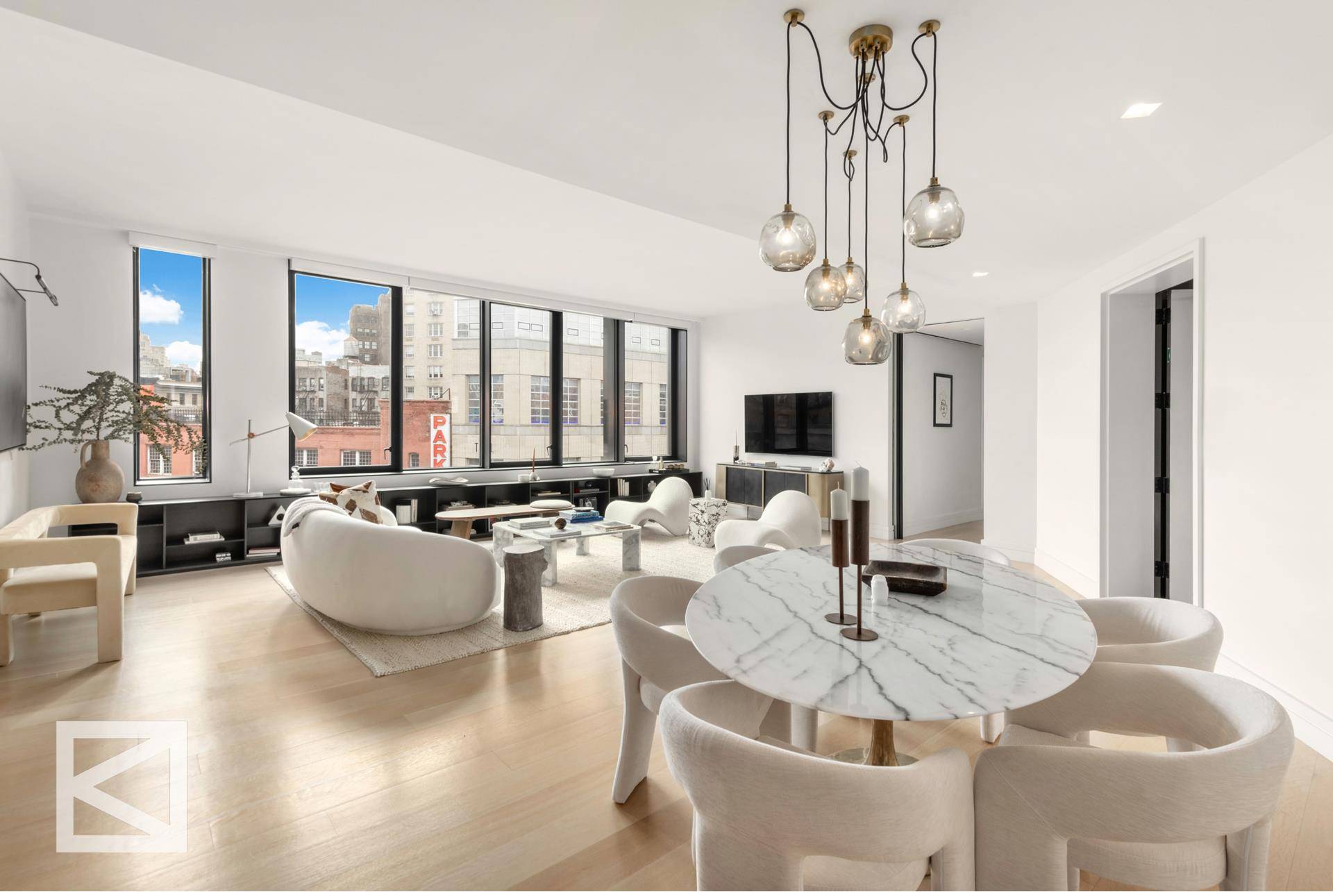 Nestled in the highly coveted West Village, situated on one of its most desirable corners, this sophisticated loft offers a truly elevated living experience.