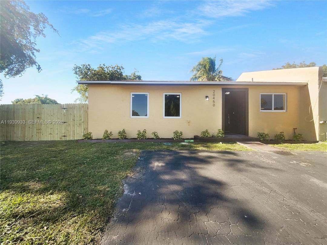 Welcome to 20450 NW 28th Ct, a beautifully renovated property that is sure to impress.