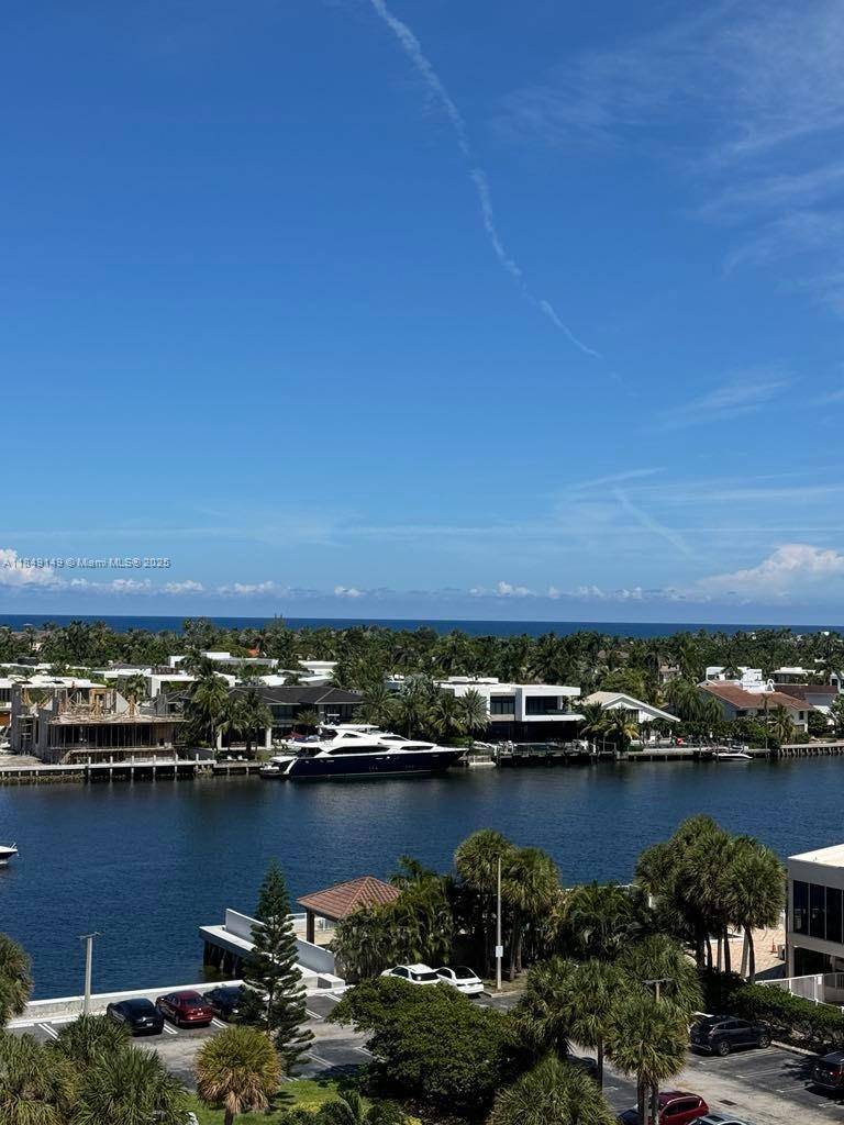 This bright and spacious residence is ideally located on East Country Club Drive, offering unobstructed Intracoastal and ocean views.