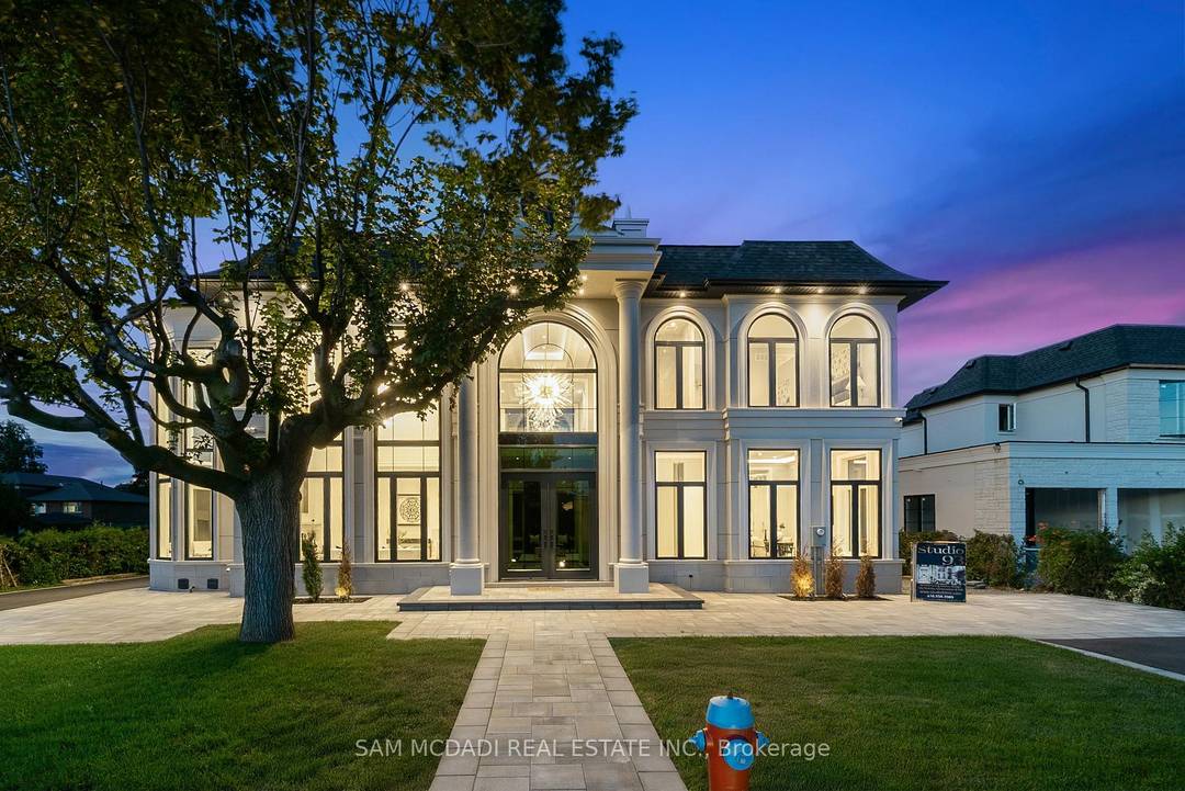 Welcome to 321 Morden Rd, a brand new French Chateau inspired estate that seamlessly blends timeless elegance with modern luxury.