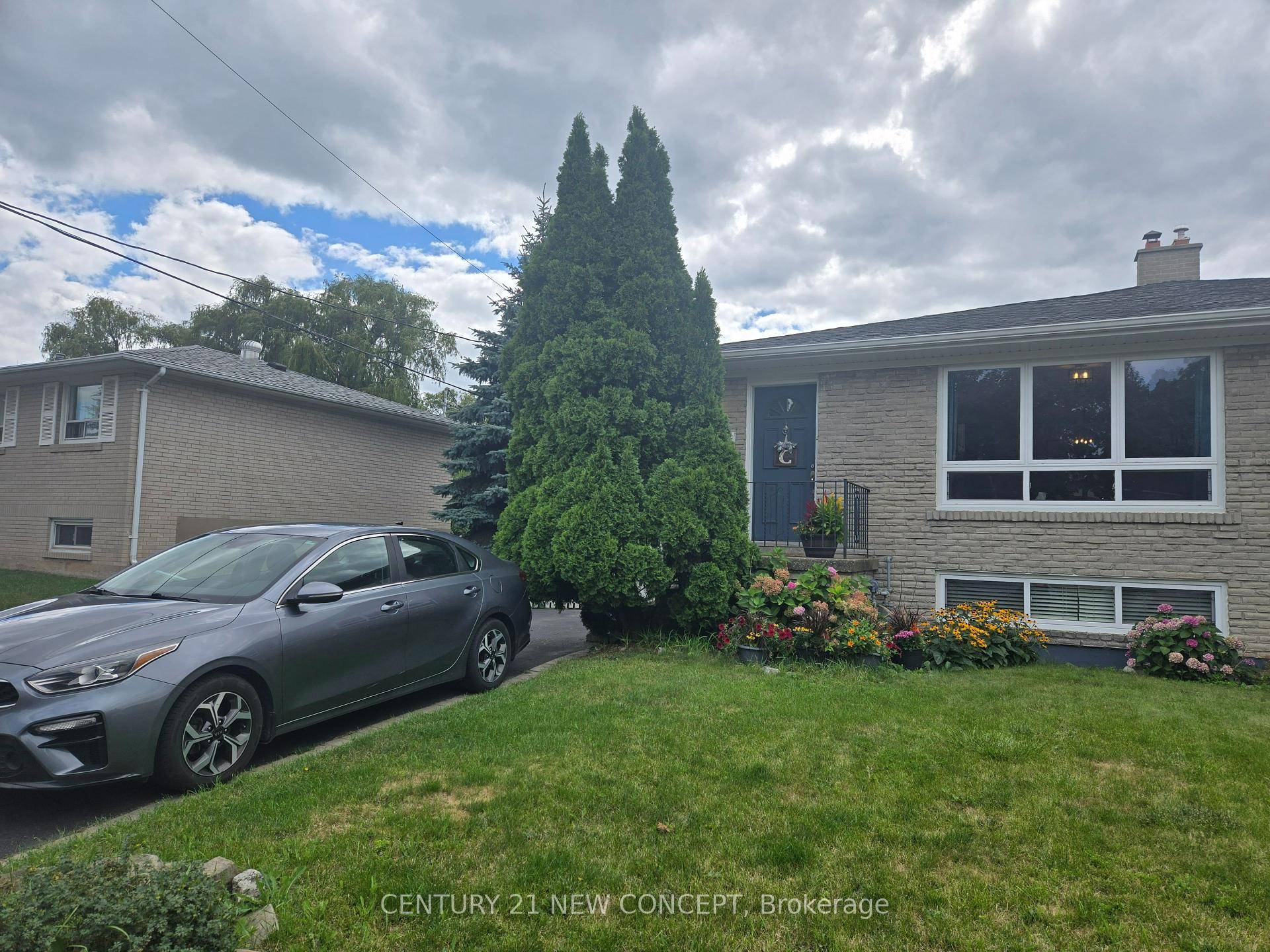 Exceptionally Well Maintained Four Level Side split Backing Onto The Ravines Of Sheldon Creek Offering Incredible Privacy with 3 separate Entrances.