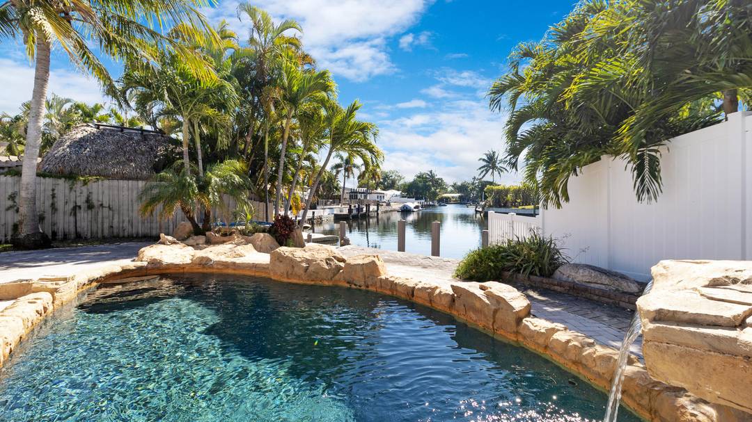 Located in the highly sought after The Cove neighborhood of Deerfield Beach, this 2 bedroom, 2 bath waterfront home offers ocean access, a NEW private dock, and is less than ...