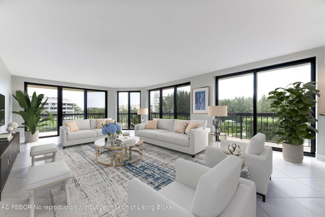 Experience the elegance of Palm Beach living in this highly desirable corner unit at Sutton Place.