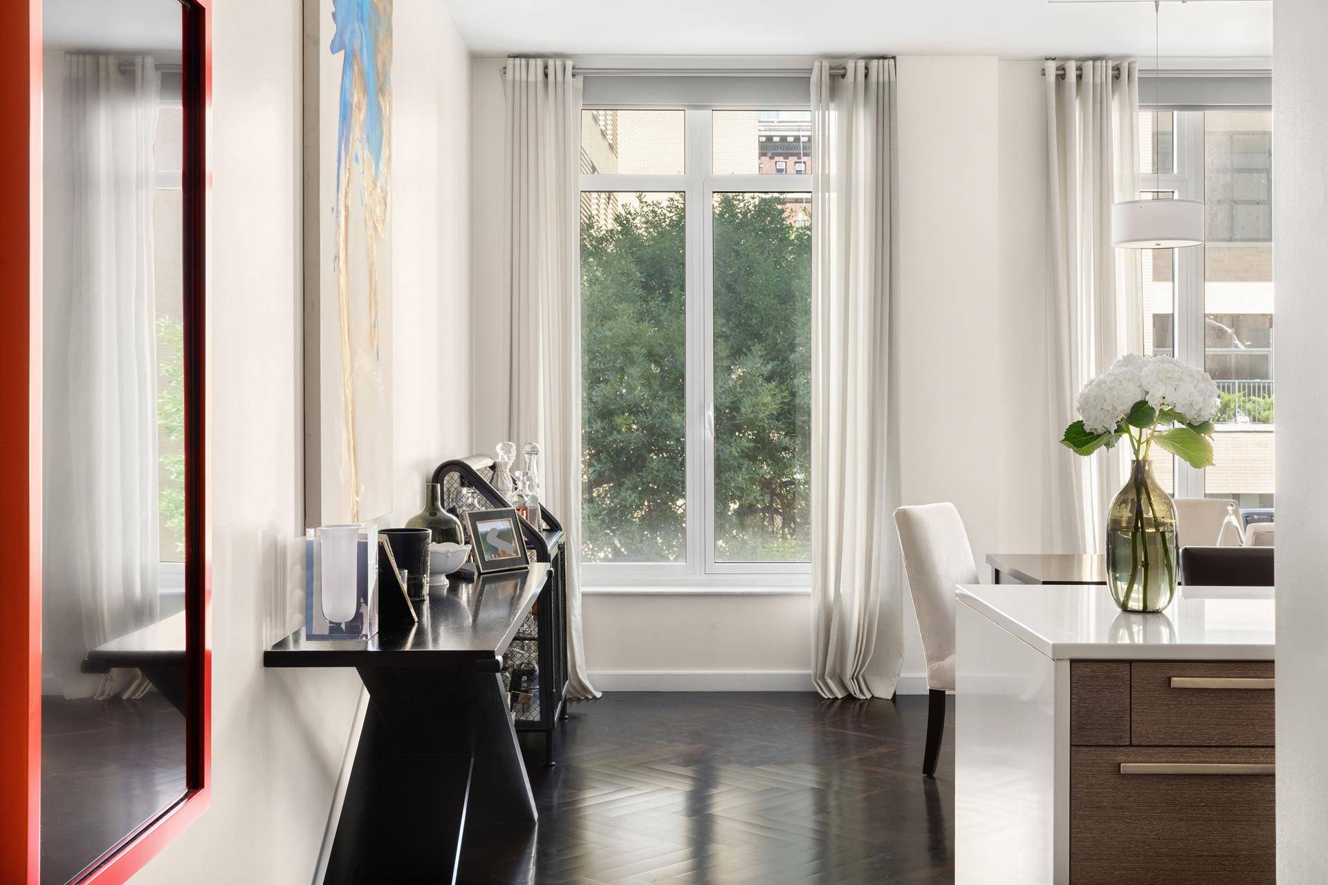 This beautiful and spacious 2 bedroom 3 bath home is the perfect place to live and work.