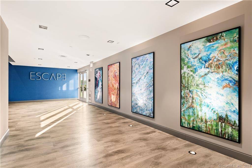 Escape to better at Harbor Point's newest luxury, waterfront residential building.