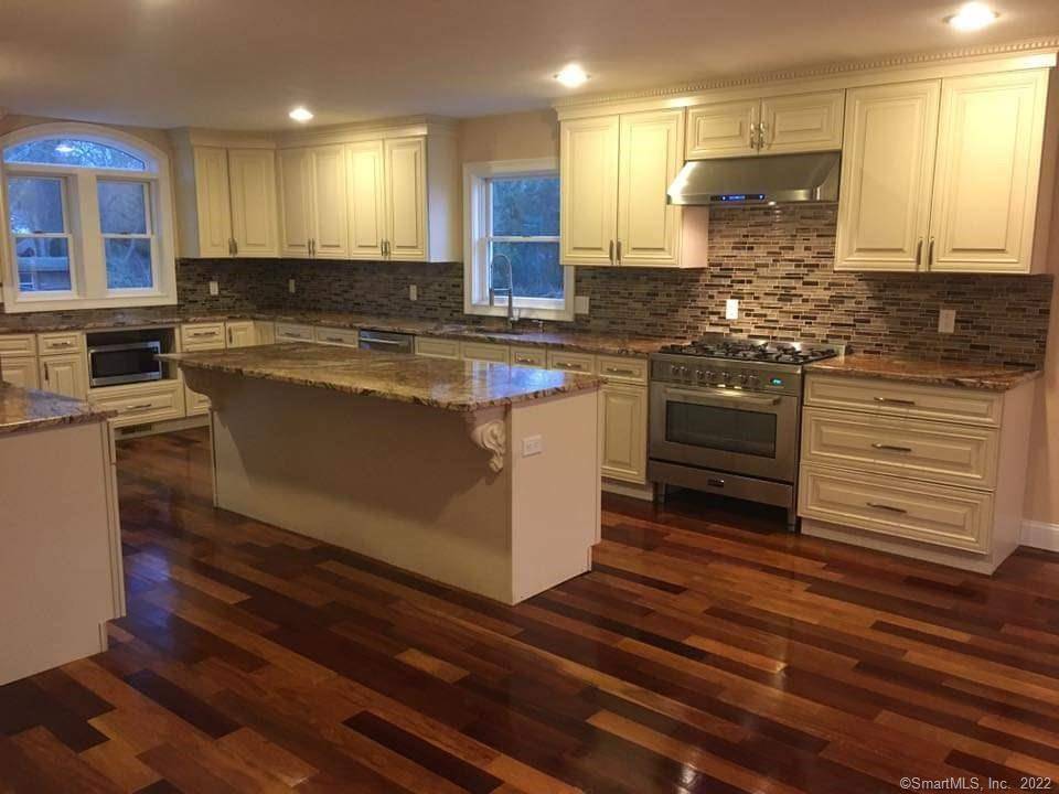 Prepare to be amazed by this deceptively modest exterior that opens into a 2, 400 sq ft beautiful home.