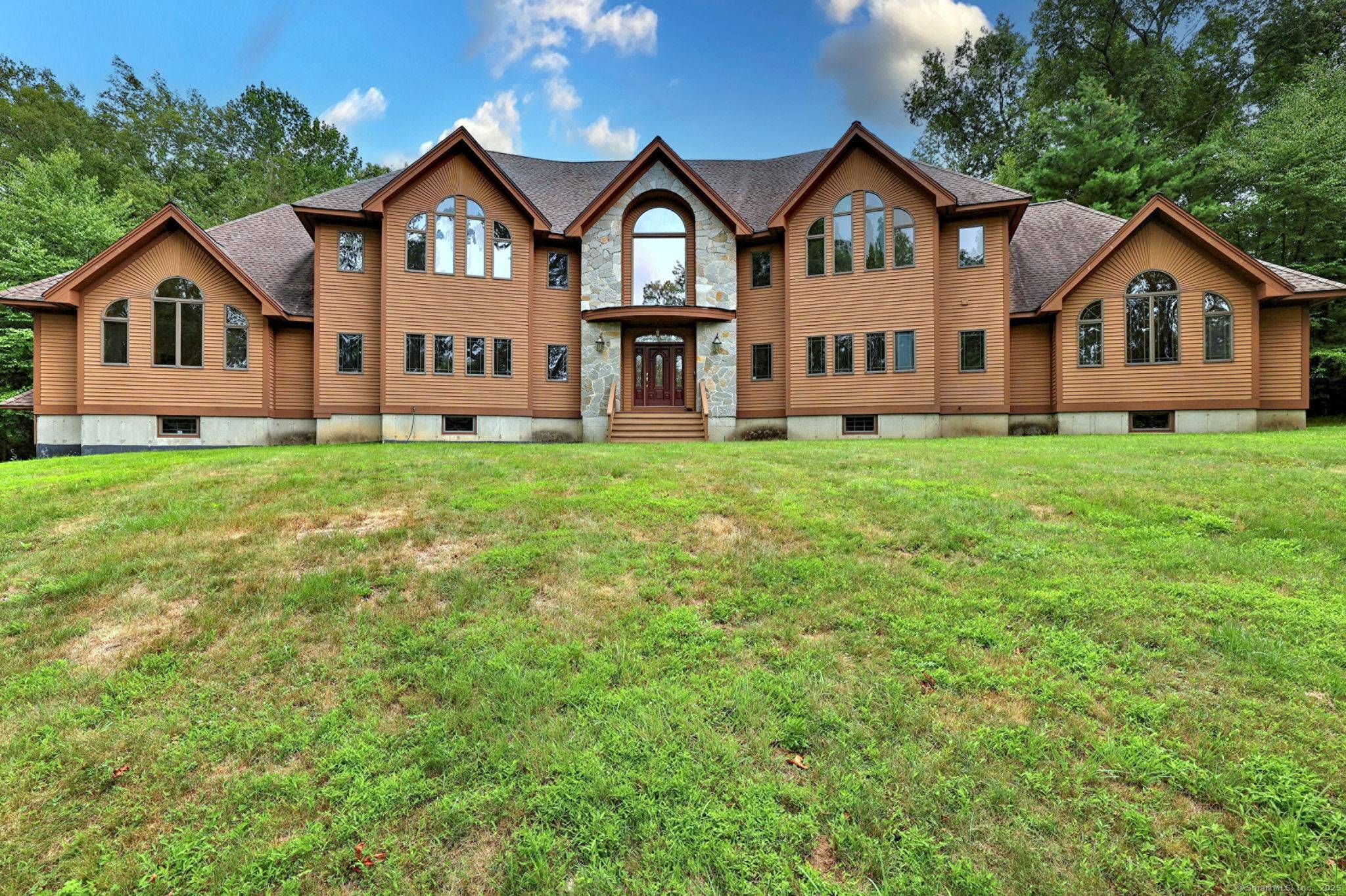 Perfect for a large or multi generational family, this expansive custom built home offers exceptional space, quality craftsmanship, and flexible living options.