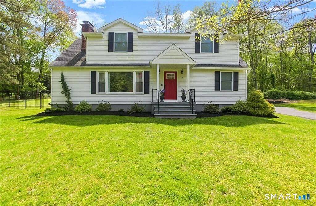 Beautifully renovated 4 bedroom, 3 bath Cape set on a private acre in desirable Easton.