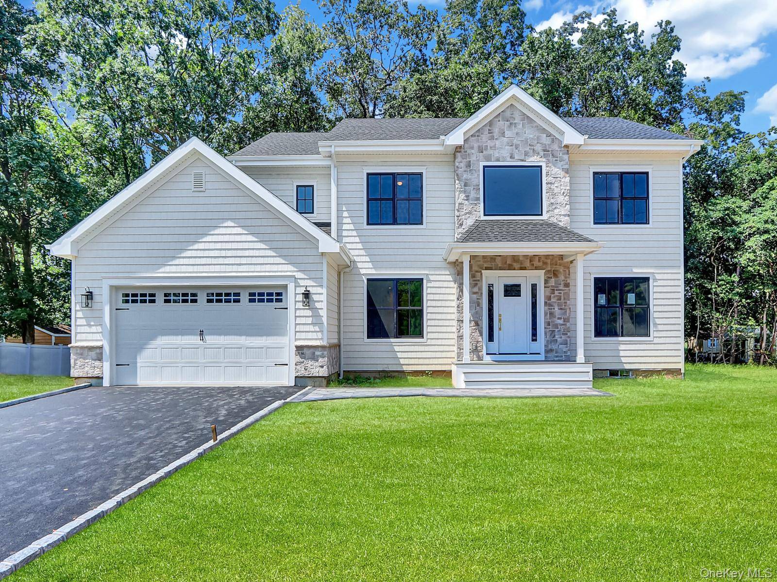This is a rare opportunity to own new construction in Setauket, featuring a 2891 square foot custom Colonial set on a quiet cul de sac on a.