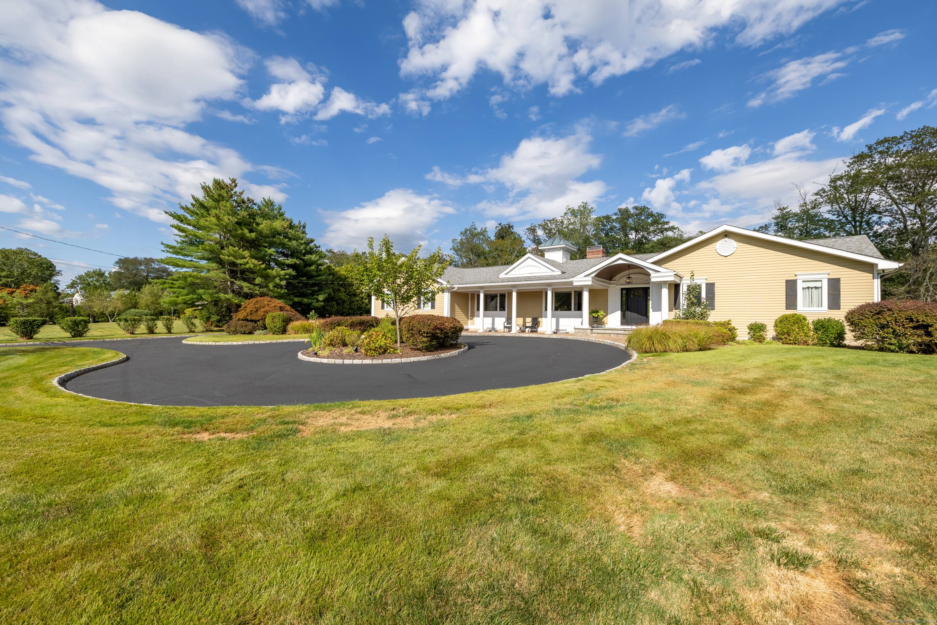 Welcome to 5 New England Drive a spacious and thoughtfully designed ranch set on a level one acre corner lot in North Stamford, offering the rare advantage of natural gas ...