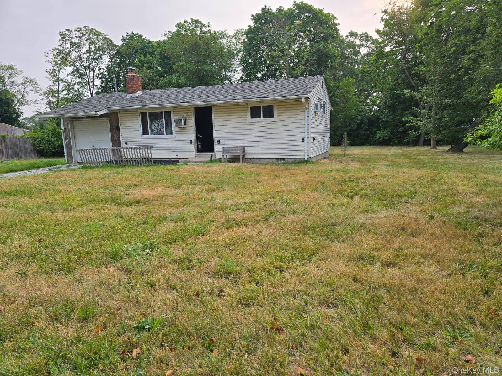 Rare opportunity for a fixer upper in Central Islip.