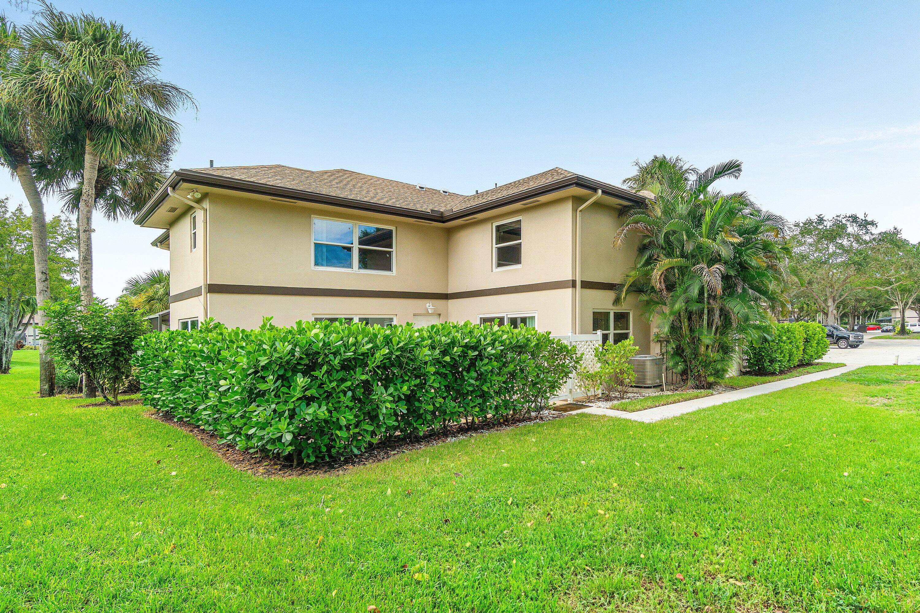 Picture yourself in this charming two story townhouse in fabulous Royal Palm Beach.