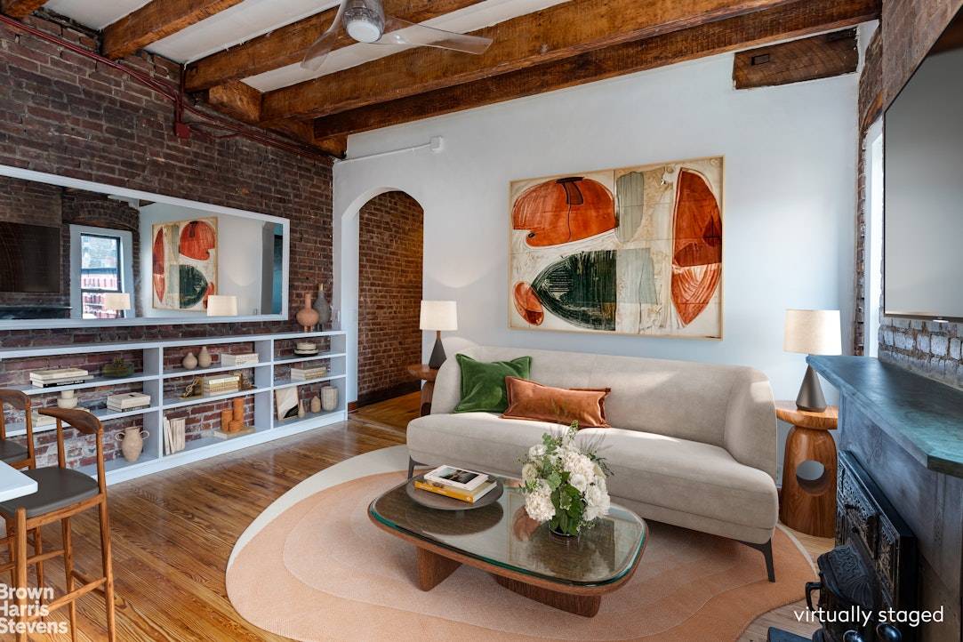 Beautiful brownstone home boasts extraordinary top floor corner south and east exposures through seven 7 that's right seven large windows that bask this home in sunlight.